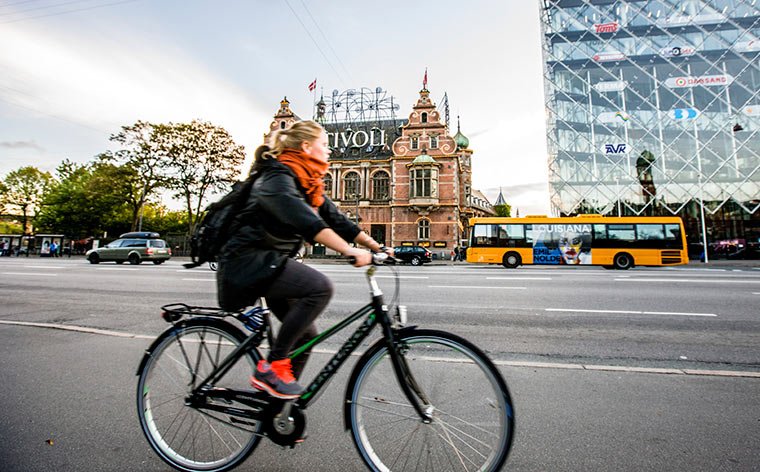 Woman biking Denmark